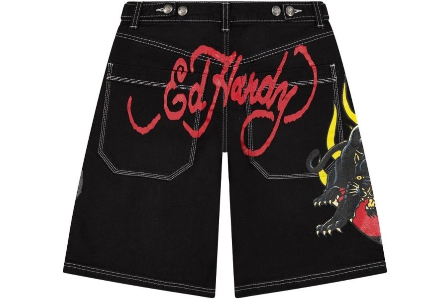 Ed Hardy black denim shorts with red logo script and fierce panther flame graphic, highlighting bold tattoo streetwear style