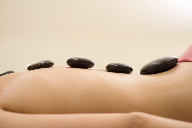 Hot Stone Massage in Tysons Corner – Benefits, Process, and What to Expect